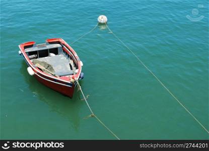 beautiful photo of a old fishing boat in Cascais, Portugal