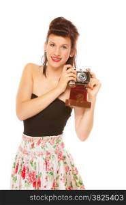 Beautiful photographer. Cute lovely retro style summer teen girl holding using vintage old camera isolated on white background