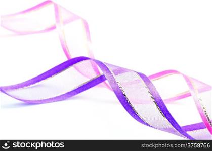 Beautiful pink and purple gift ribbon, isolated on a white background