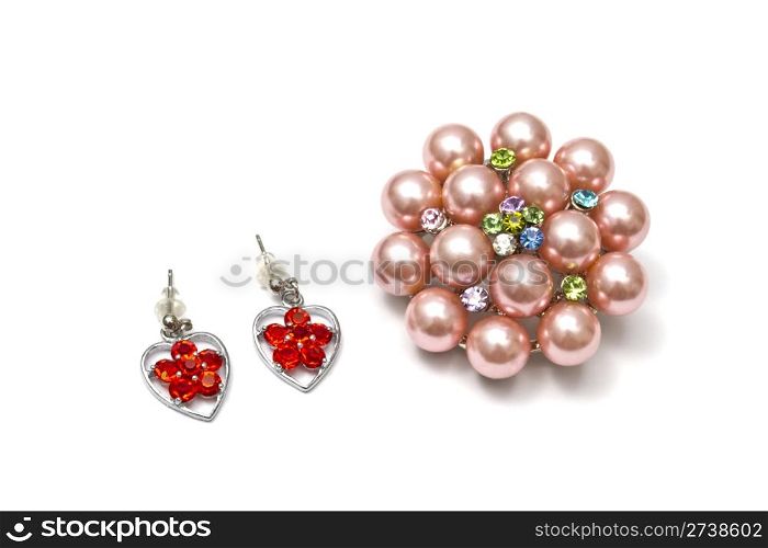 Beautiful pink brooch isolated on white background