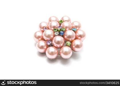 Beautiful pink brooch isolated on white background