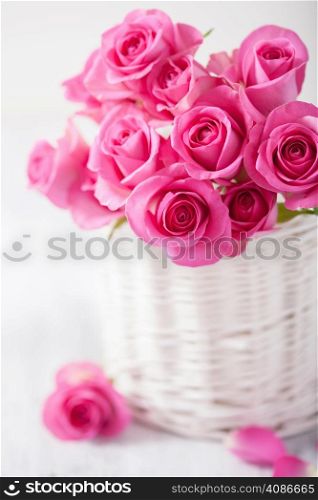beautiful pink roses bouquet in basket