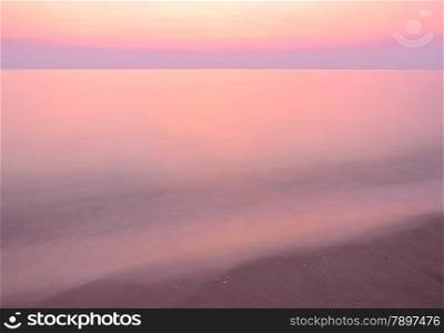 Beautiful pink sunrise at the beach