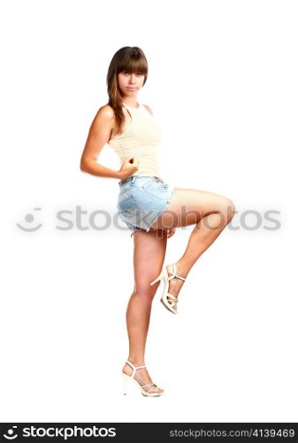 beautiful platinum blond female wearing jean shorts and top on isolated background