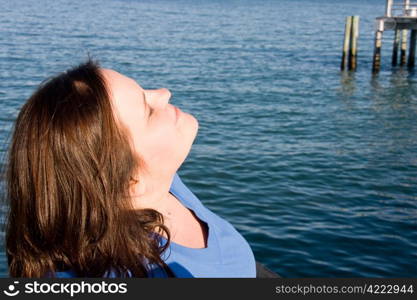 Beautiful plus sized model soaking up the sun on vacation.