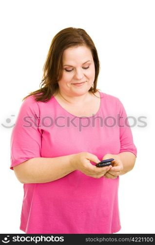Beautiful plus-sized model texting on her new cell phone. Isolated on white.