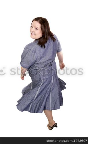 Beautiful plus sized model twirling around with her dress flaring. Full body isolated on white.