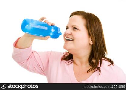 Beautiful plus-sized woman drinking water after her workout. Isolated on white.