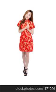 Beautiful portrait happy Chinese New Year young asian woman wear cheongsam fashion smile with gesture congratulation and greeting isolated on white background, festival and celebrate concept.