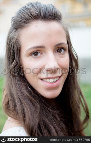 Beautiful portrait of a cool girl with brown eyes looking at camera