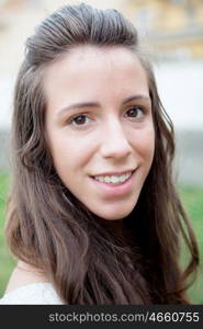 Beautiful portrait of a cool girl with brown eyes looking at camera