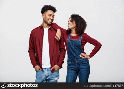 Beautiful portrait of a happy African American couple isolated over white.. Beautiful portrait of a happy African American couple isolated over white
