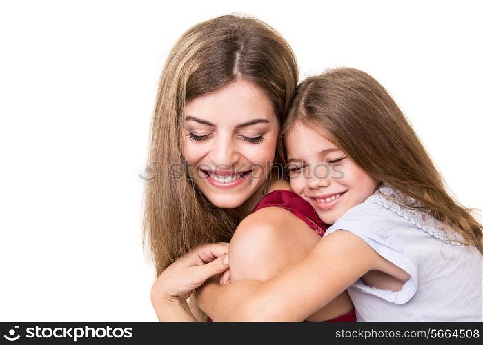 Beautiful portrait of hugging mother and daughter