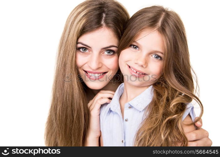 Beautiful portrait of hugging mother and daughter