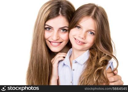 Beautiful portrait of hugging mother and daughter