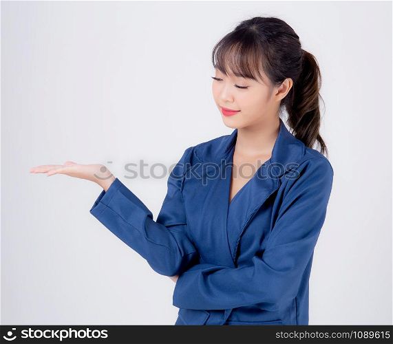 Beautiful portrait young asian business woman presenting and showing with confident isolated on white background, asia secretary or adviser businesswoman hand palm with empty for advertising concept.