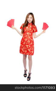 Beautiful portrait young asian woman cheongsam dress smiling holding red envelope on white background, beauty asia girl wear qipao celebrate with exciting, happy Chinese New Year, holiday concept.