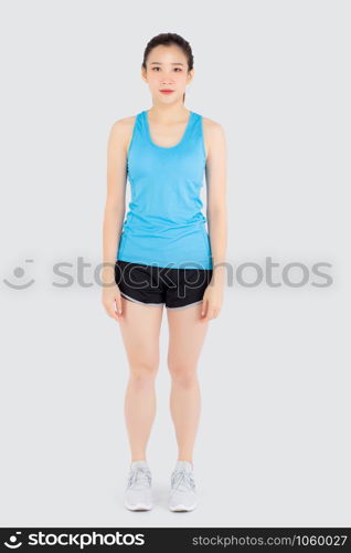 Beautiful portrait young asian woman in sport clothes with satisfied and confident isolated on white background, asia girl cheerful have shape and wellness, exercise for fit with health concept.