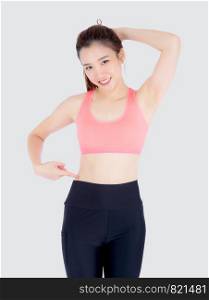 beautiful portrait young asian woman in sport clothing pointing waist with satisfied and confident isolated on white background, girl asia have shape and wellness, exercise for fit with health concept.