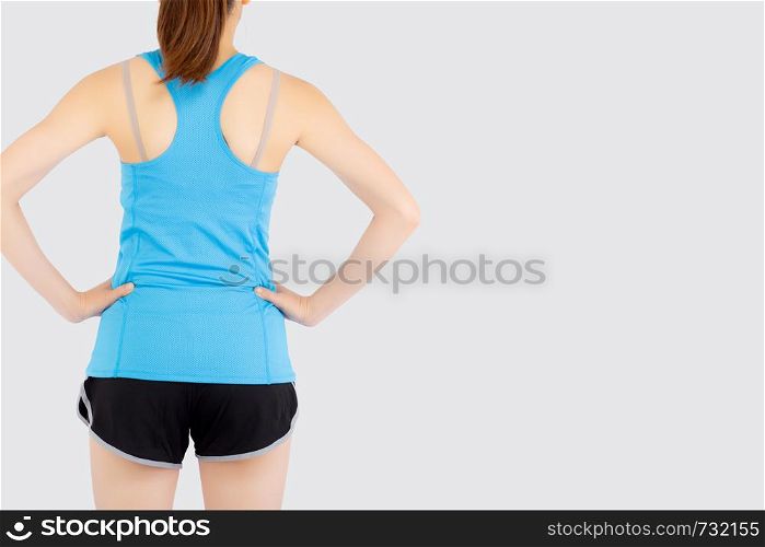 Beautiful portrait young asian woman in sport clothing with satisfied and confident isolated on white background, back of girl asia have shape and wellness, exercise for fit with health concept.