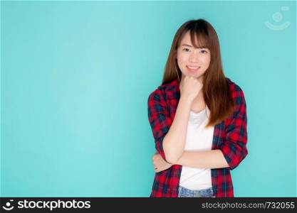 Beautiful portrait young asian woman wear clothes fashion travel smile expression confident enjoy summer holiday isolated blue background, model asia girl enjoy and cheerful, travel concept.