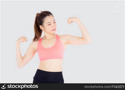 Beautiful portrait young asian woman wear sport clothes strong and muscle with health, girl show biceps with exercise and workout for wellness isolated on white background, strength and fit concept.