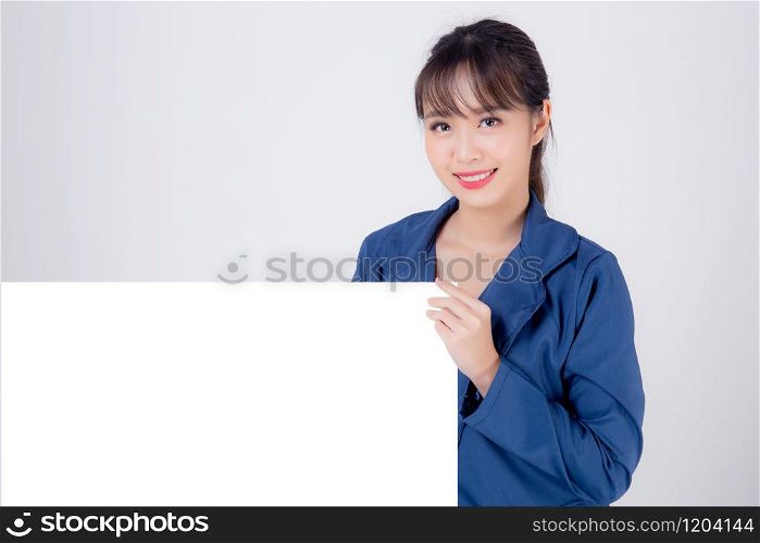 beautiful portrait young business asian woman presenting blank signboard isolated on white background, cheerful and happy beauty businesswoman showing empty billboard or banner for advertising.