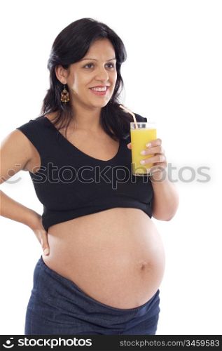 Beautiful pregnant drinking juice of orange on a over white background