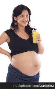 Beautiful pregnant drinking juice of orange on a over white background
