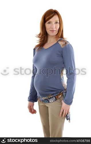 Beautiful pregnant redhead woman fashion white background