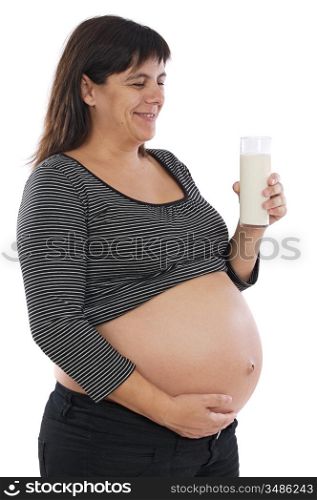 Beautiful pregnant with an glass of milk on a over white background