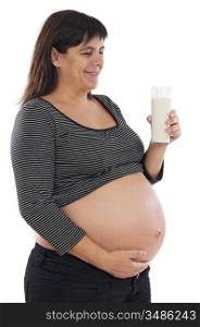 Beautiful pregnant with an glass of milk on a over white background