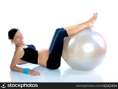 Beautiful pregnant woman at fitness gym with on aerobics ball