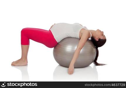 Beautiful pregnant woman doing pilates isolated on white background