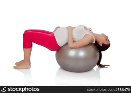 Beautiful pregnant woman doing pilates isolated on white background