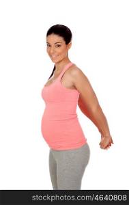 Beautiful pregnant woman doing sport isolated on white background