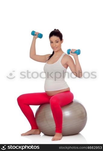 Beautiful pregnant woman doing sport isolated on white background