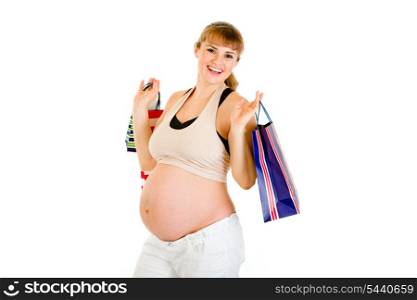 Beautiful pregnant woman holding shopping bags in hands isolated on white&#xA;