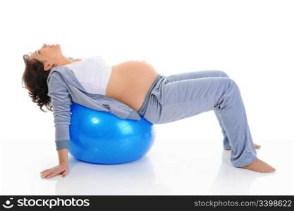 Beautiful pregnant woman sitting with exercise bal. Isolated on white background