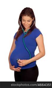 Beautiful pregnant woman with a stethoscope isolated on a white background