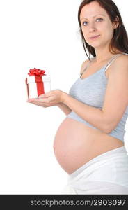 Beautiful pregnant woman with gift box