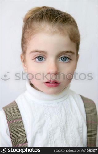 Beautiful preschooler blue eyes portrat with school dress