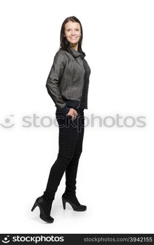 Beautiful professional brunette posing for camera. Casual clothes. Isolated on White.