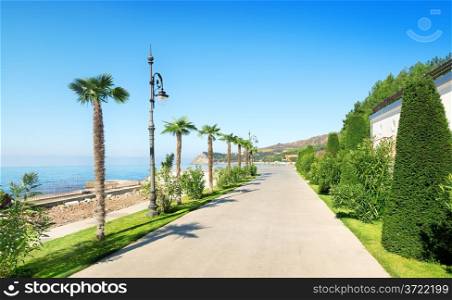 Beautiful promenade near the sea in sunny summer day
