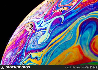 Beautiful psychedelic abstraction - interference in soap films in reflected light. Abstract background. Beautiful psychedelic abstraction - interference in soap films in reflected light.