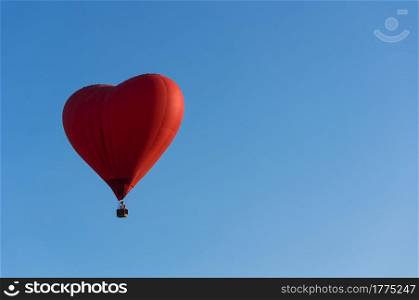 Beautiful Red Balloon in the blue sky at Balloon festival in Chiang rai, Thailand.. Red Balloon