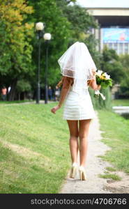 Beautiful red hair bride wearing wedding dress