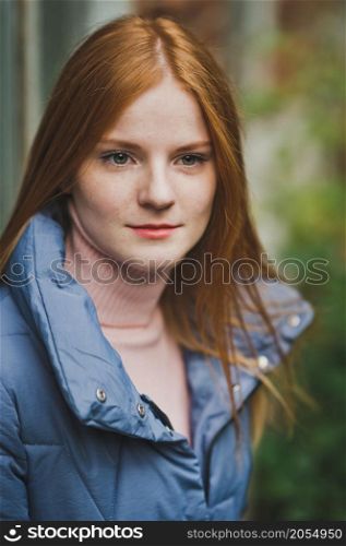 Beautiful red-haired girl with long hair.. A large portrait of a red-haired girl 2738.