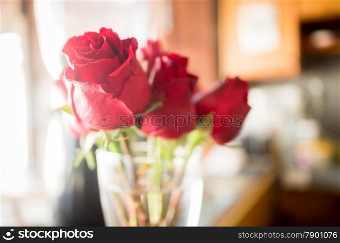 Beautiful red rose bouquet on vintage background, stock photo