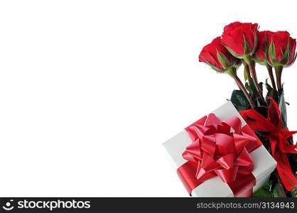 beautiful red roses and present with ribbon
